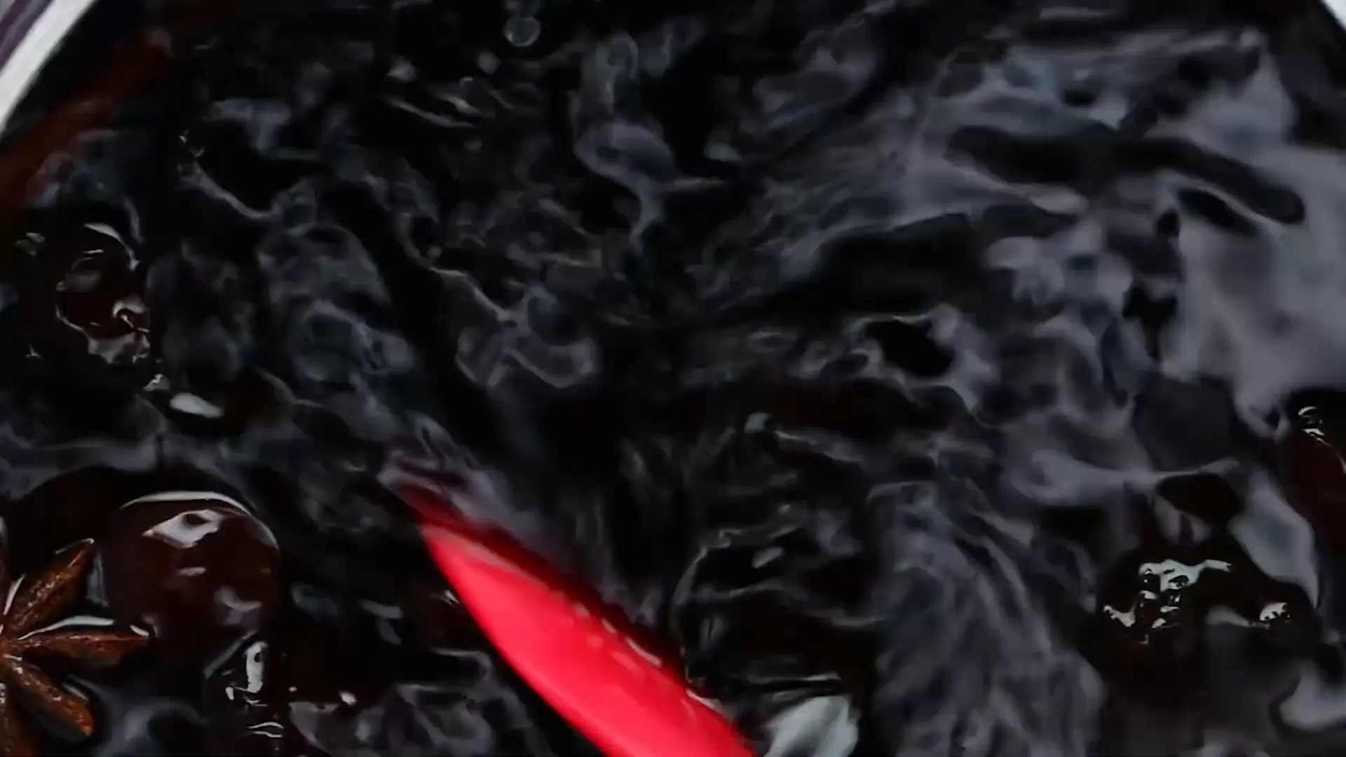 Mixing burnt sugar for Trinidad Black Cake