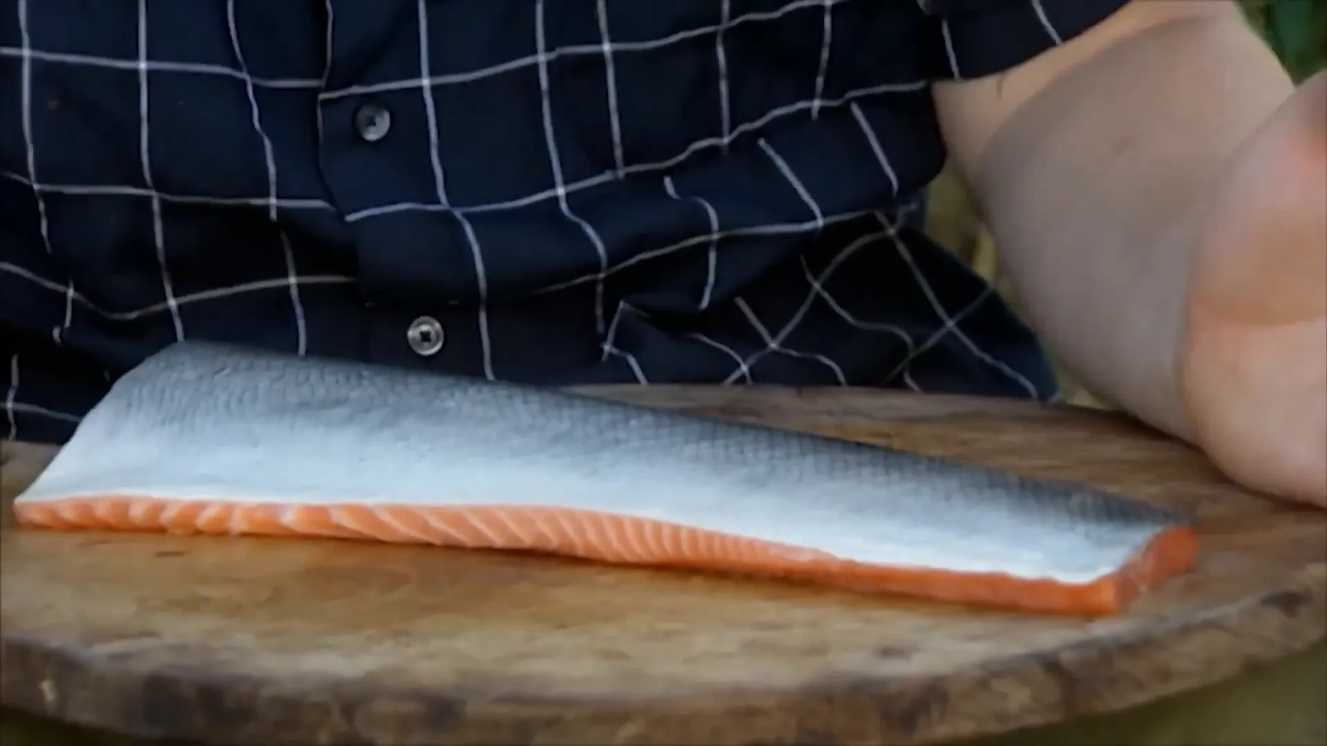 Fresh organic salmon with silvery skin ready for barbecue