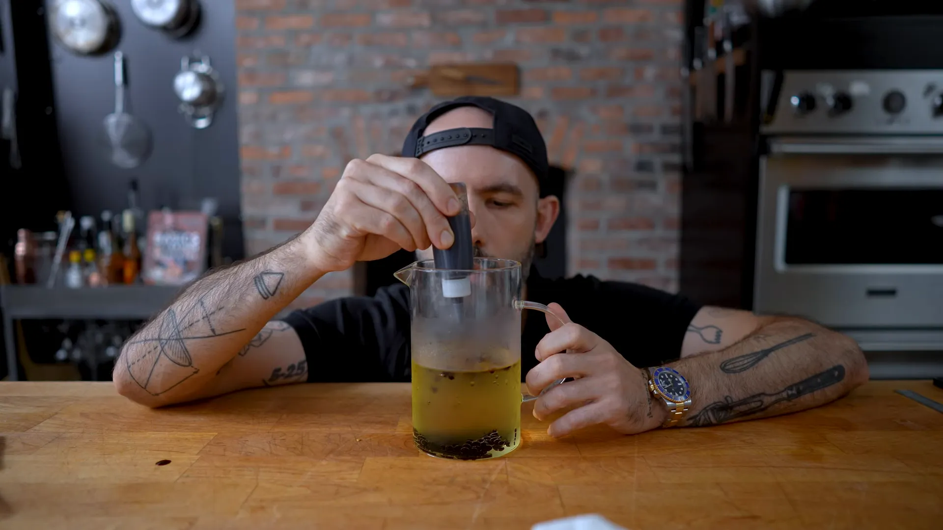 Balsamic pearls setting in chilled oil