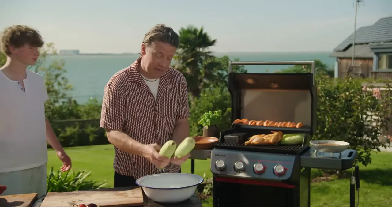 Sweet corn soaking in water ready for the grill