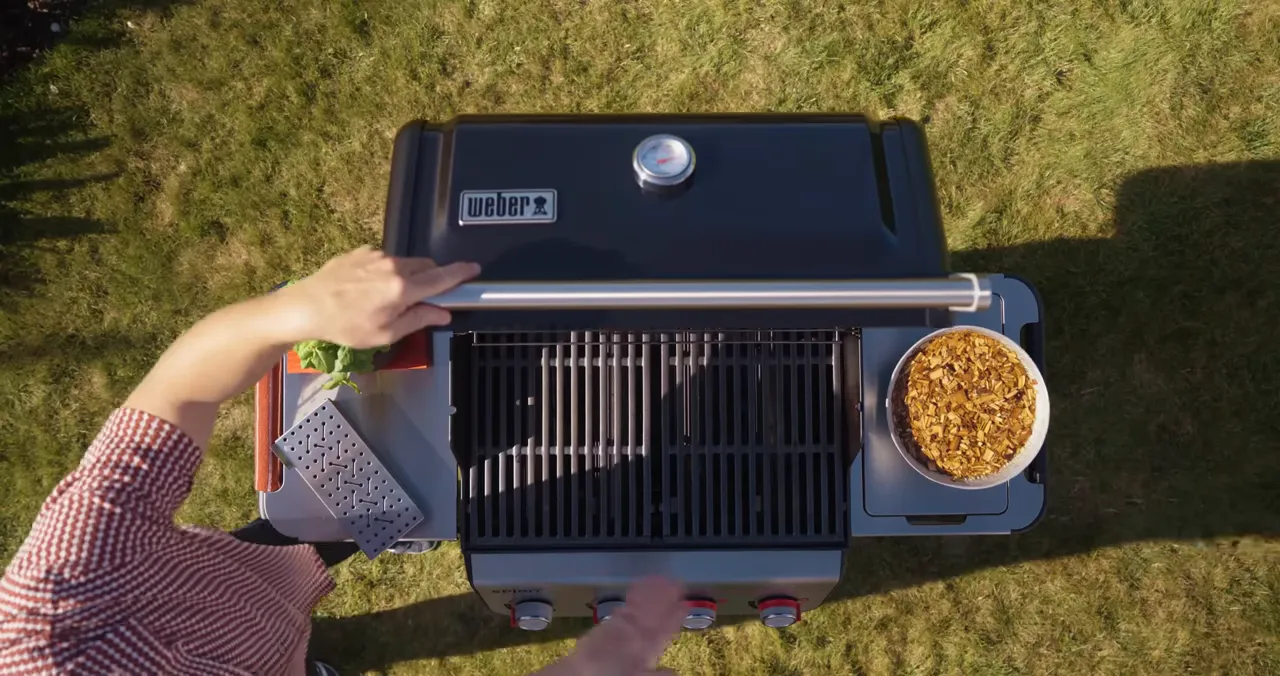 Weber Spirit preheated with thermometer visible