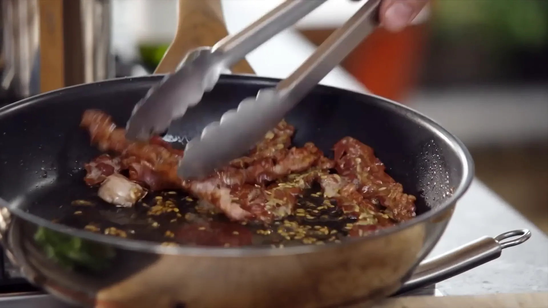 Crispy pancetta with fennel seeds in a pan