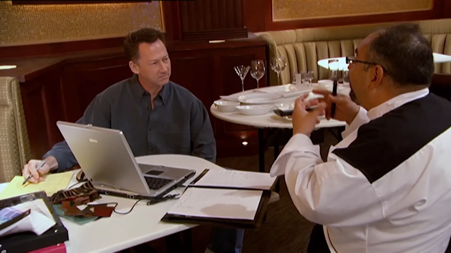 Design meeting with John Janovs as chefs discuss menus and dining room look