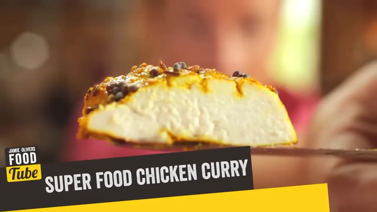 close-up cross-section of spiced chicken breast showing tender, cooked interior