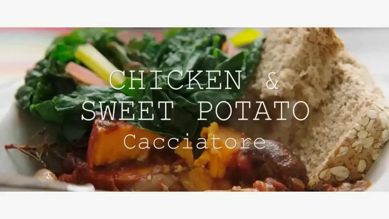 plated chicken and sweet potato cacciatore with steamed greens and bread