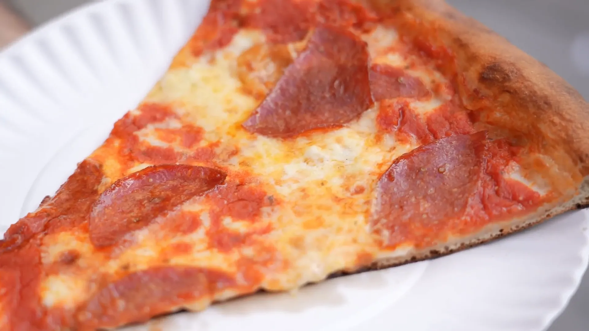 Fini Pizza's artisanal slice with halved pepperoni