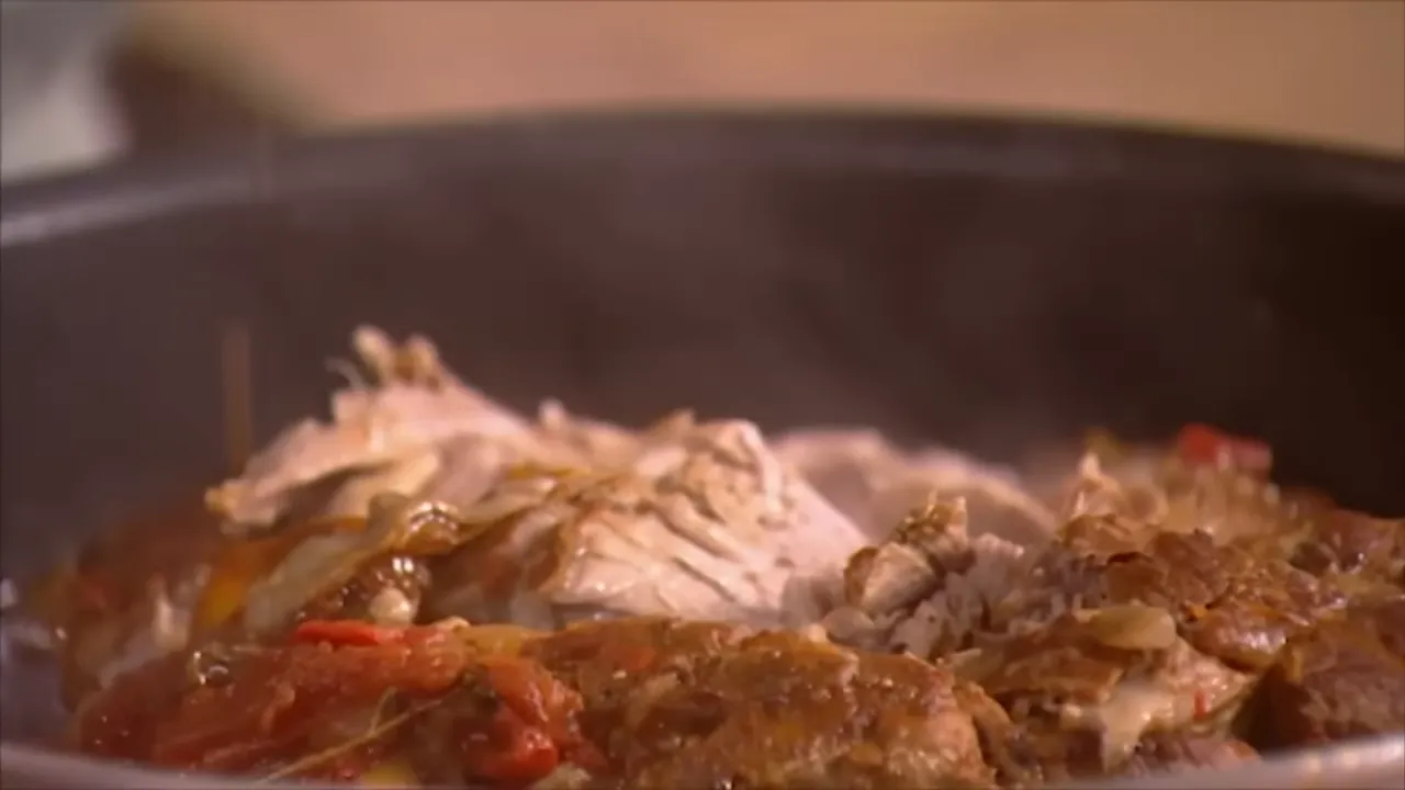 Finished pork stew shredding apart, ready to serve