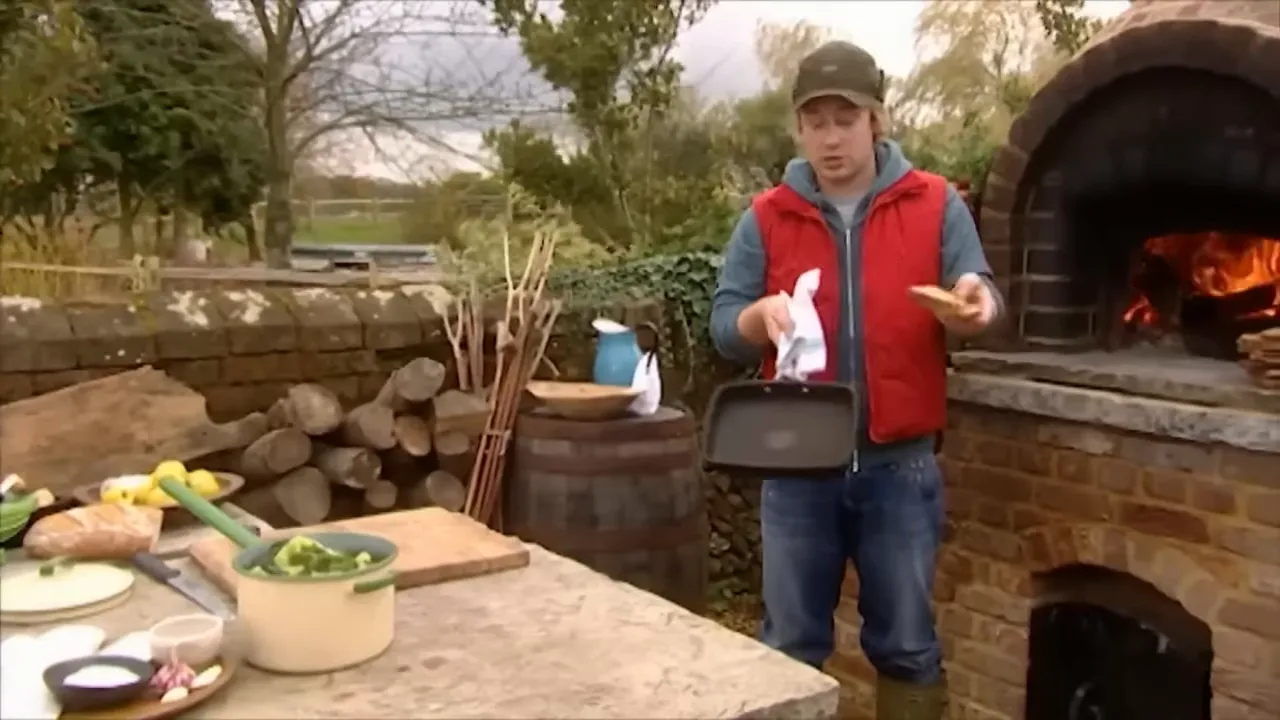 Casserole pan layered with cabbage, bread and melting cheeses