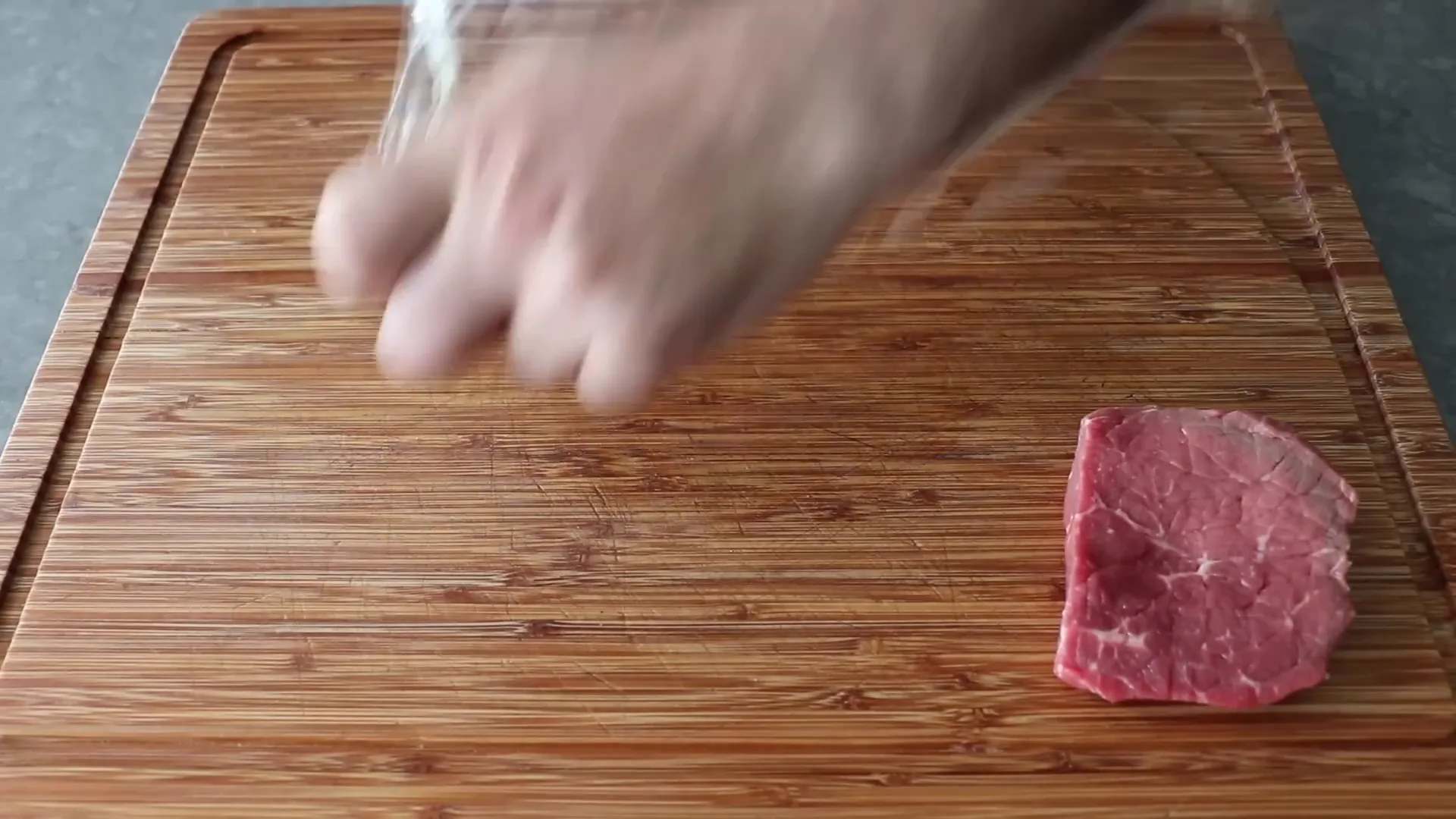 Top round steak portioned and pounded to quarter inch thickness