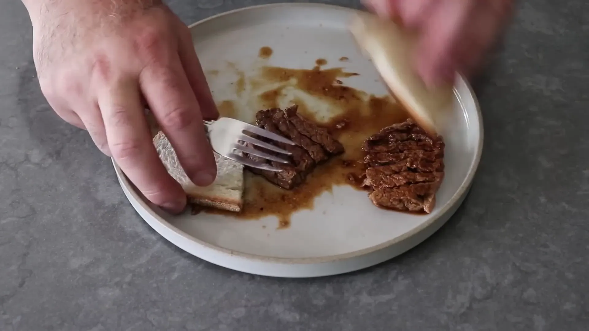Juicy diamond cut steak served with bread for soaking up juices