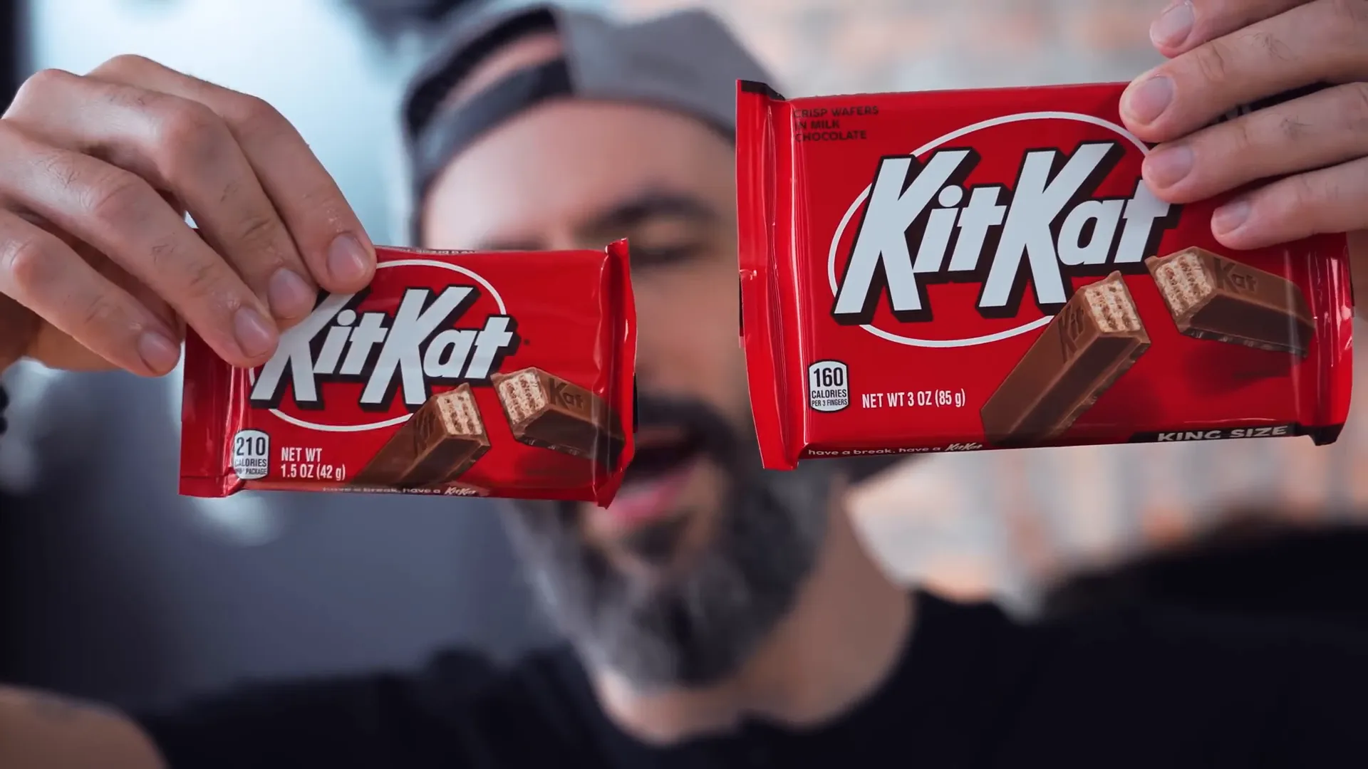 Regular and king-sized Kit Kat bars with different logos