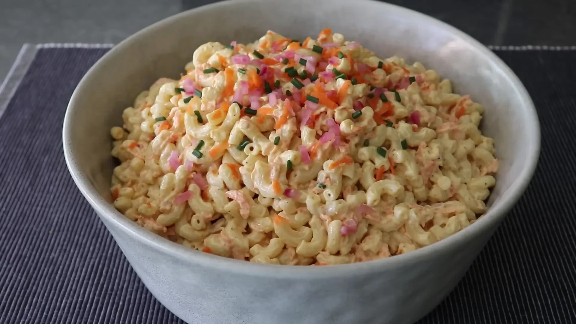 Finished Hawaiian macaroni salad garnished and ready to serve