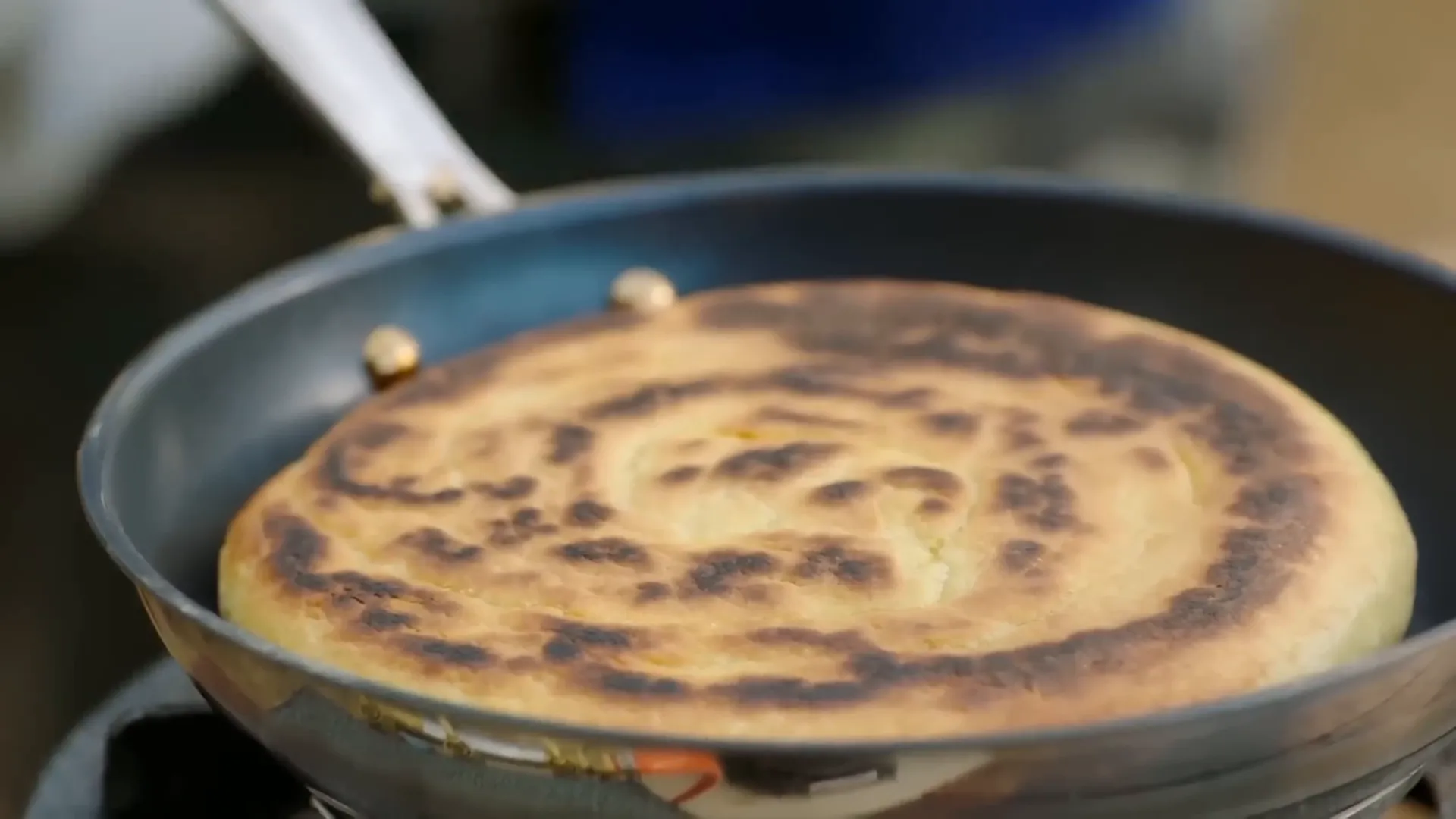 Golden mustard flatbread with flaky layers