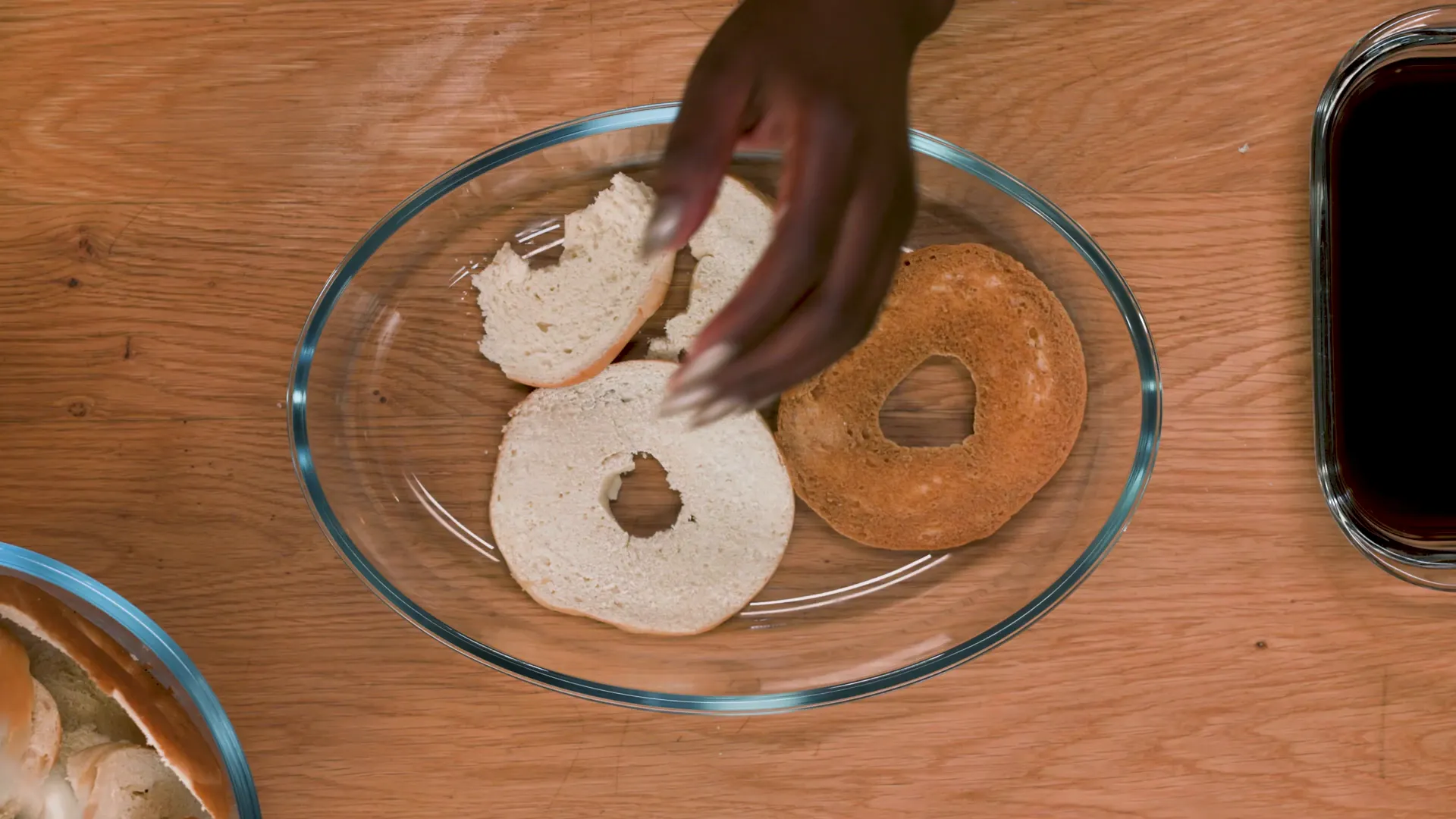 Layering coffee-soaked bagels with cream cheese filling