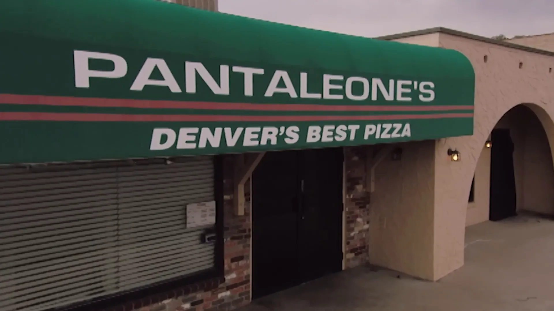 Pantaleone's old restaurant exterior with the bold 'Denver's best pizza' sign