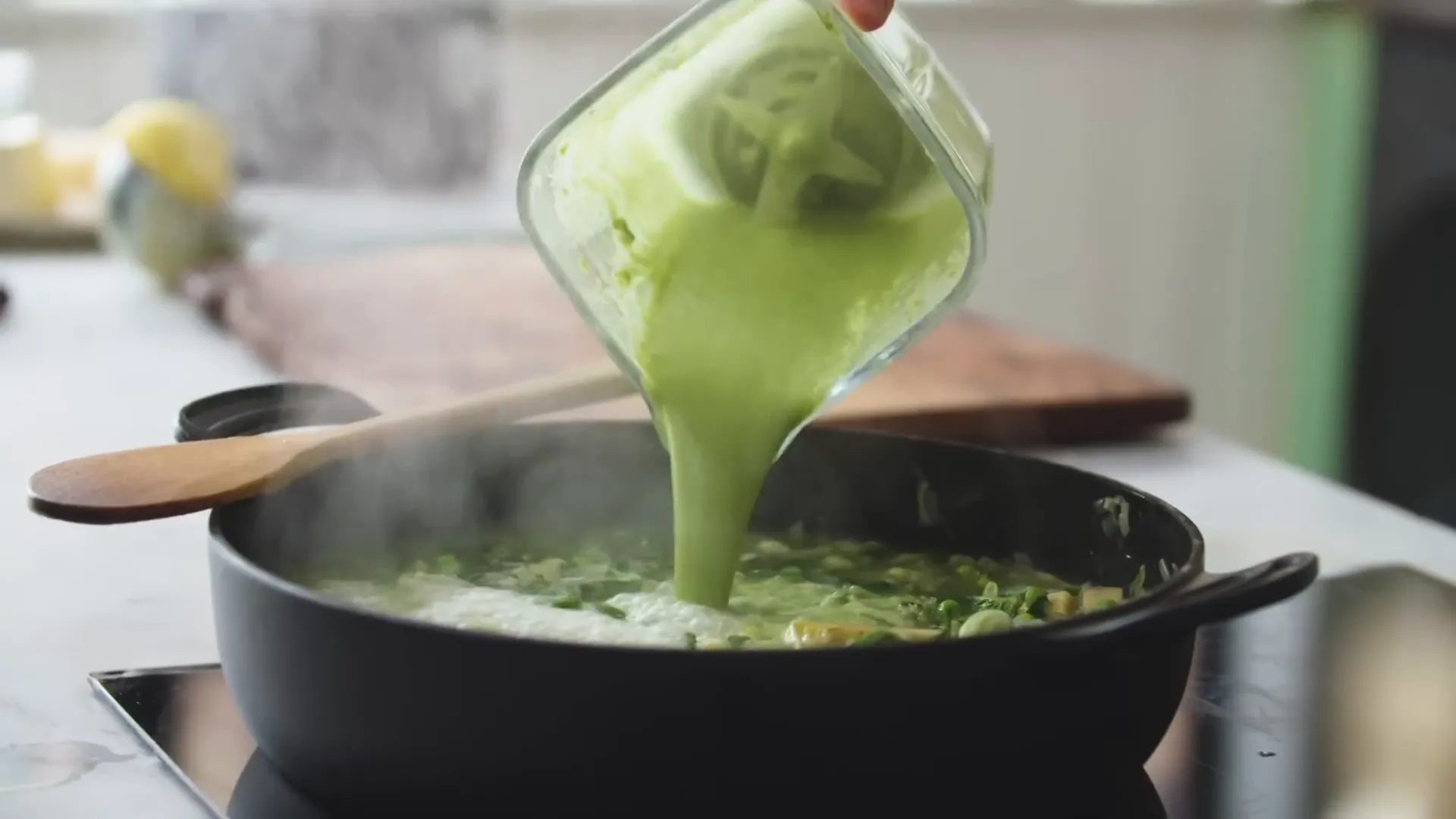 Blending part of the soup to create creamy texture