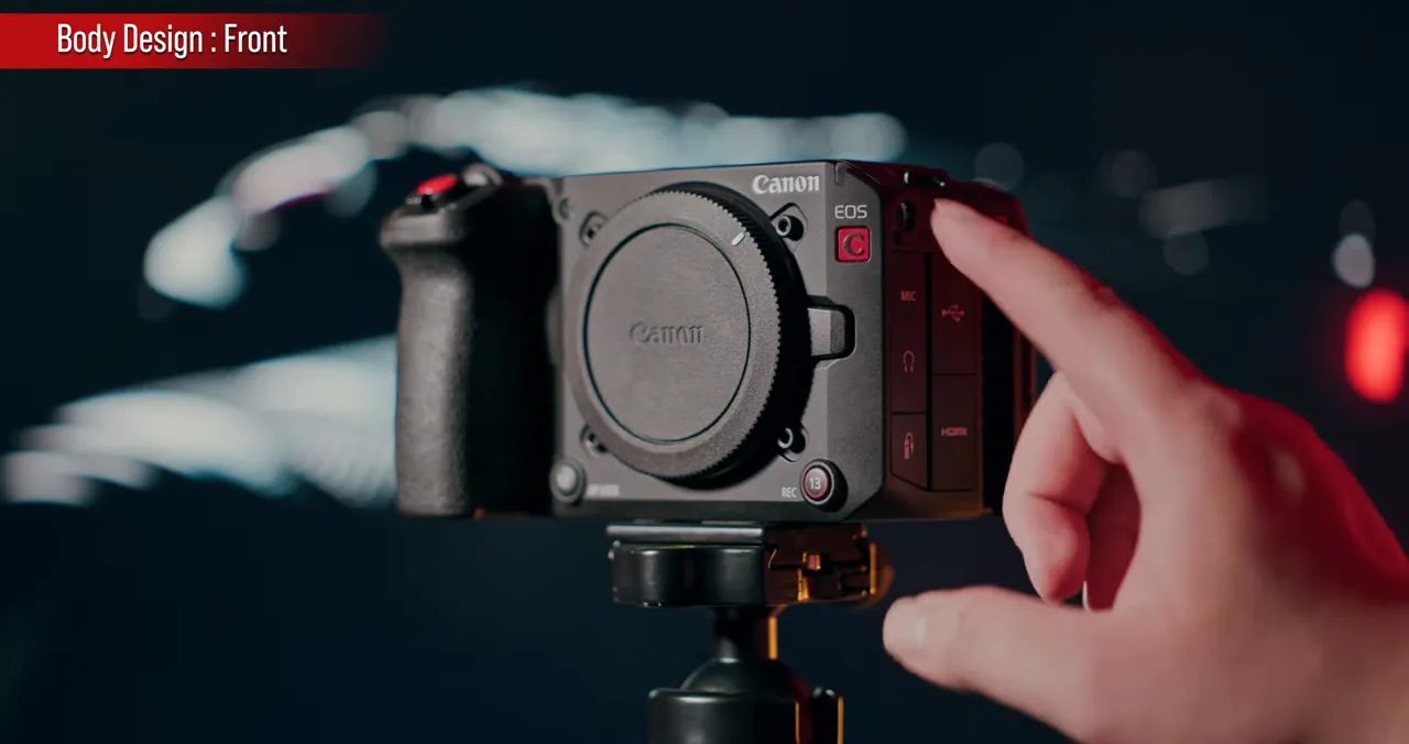 รีวิว Canon EOS C50 กล้อง Cinema ตัวเล็กที่ให้ 7K RAW Open Gate และ 4K 60p แบบไม่ครอป จนผมรู้สึกว่าแทบไม่ต้องการอะไรเพิ่มแล้ว 9 มือกำลังชี้ตำแหน่งปุ่มบน Canon EOS C50 มุมมองด้านหน้า