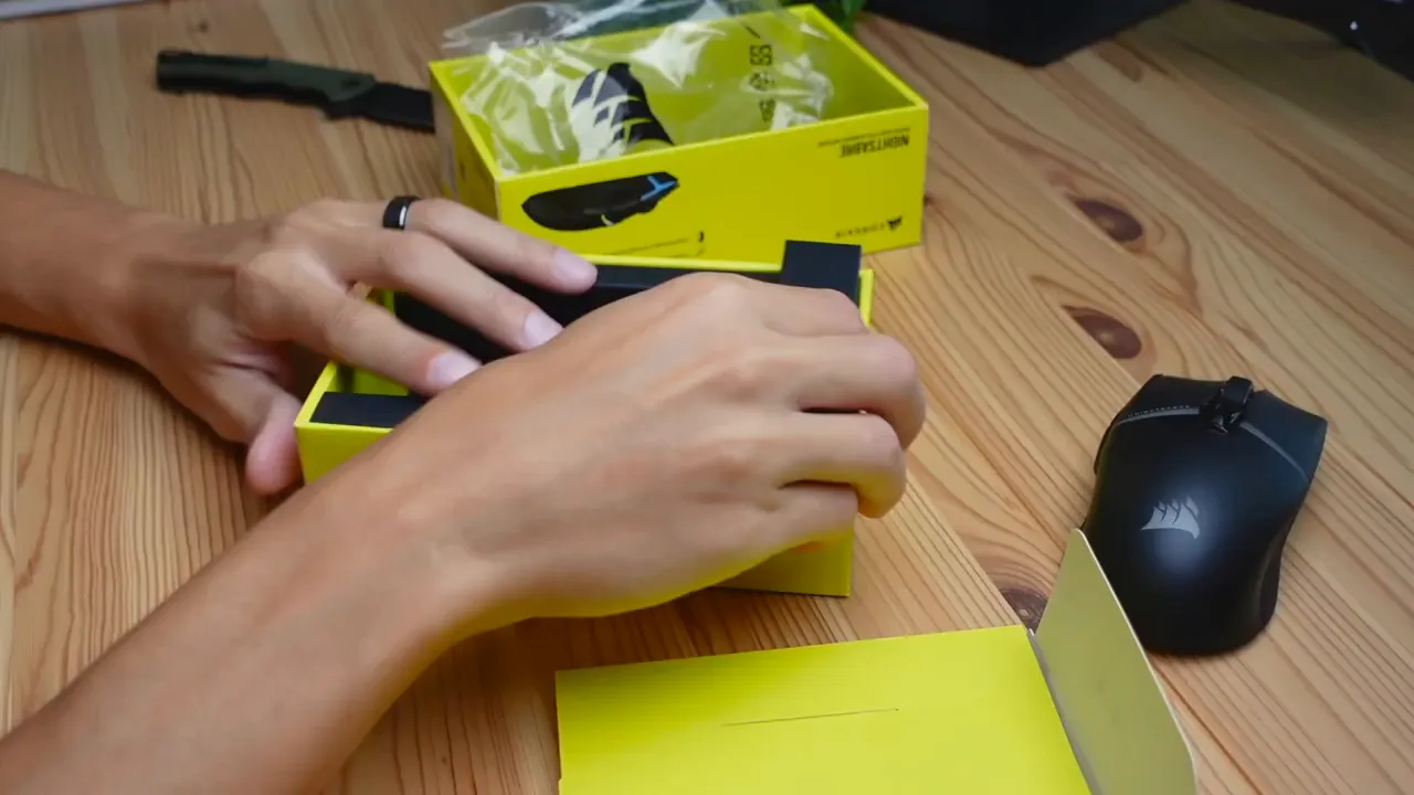 NightSabre mouse sitting in the box, freshly unwrapped