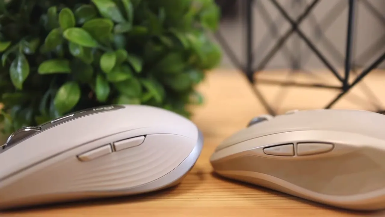 Close side view of both mice showing the side button placement
