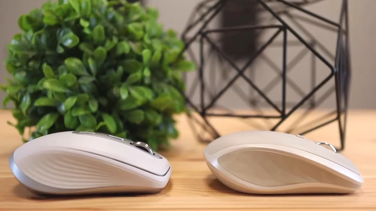 Side view of two compact mice showing different body shapes and grip textures