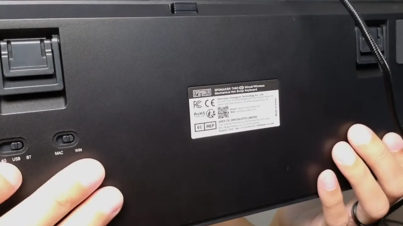 Epomaker TH80 SE underside showing the Mac/Win OS switch, flip feet and product label clearly
