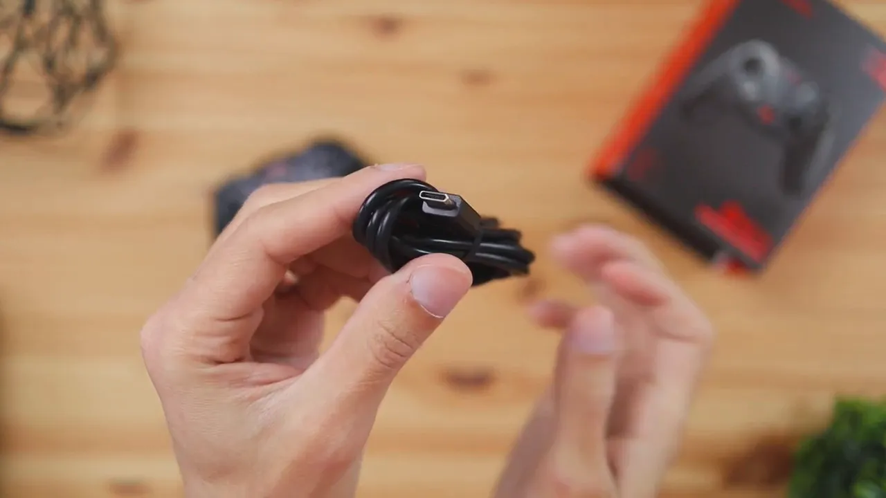 Close-up of the GameSir G4 Pro included USB-C charging cable
