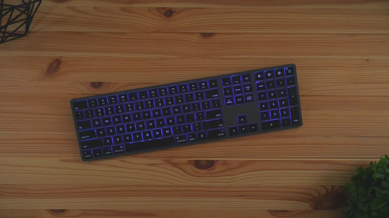 Top-down shot of Seenda full-size wireless Bluetooth keyboard with blue backlit keys