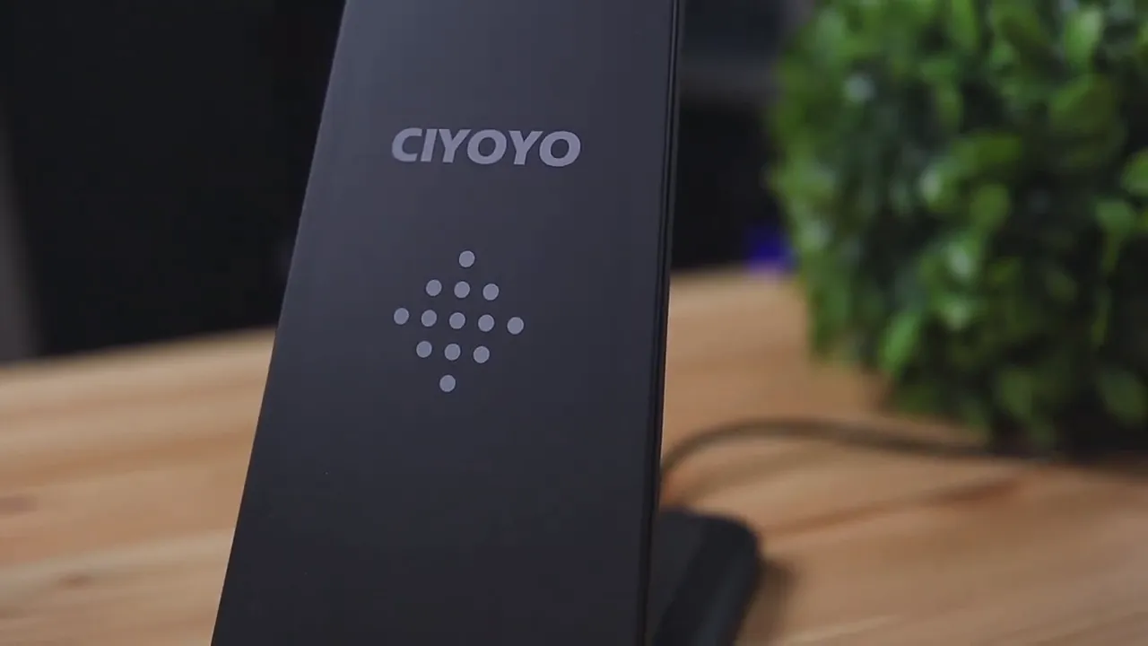CIYOYO 3‑in‑1 wireless charging stand closeup showing logo, dotted pad, and rubberized finish