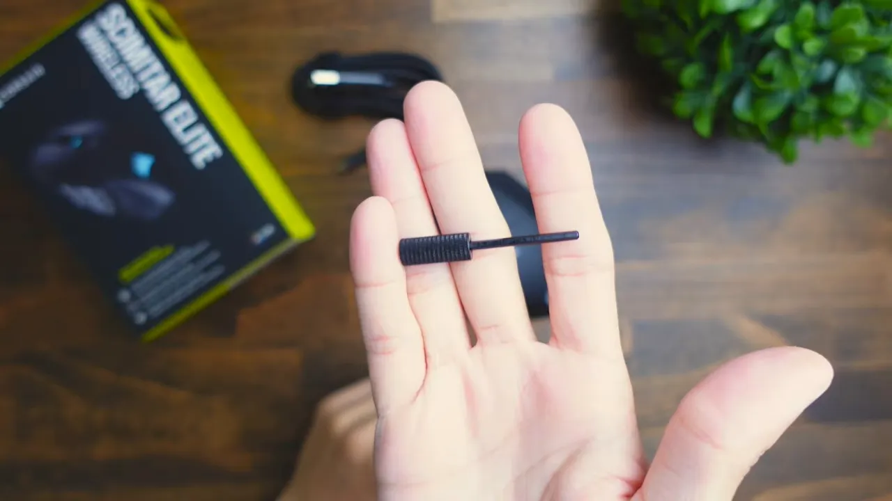 Close-up of the metal tool for adjusting side-button position