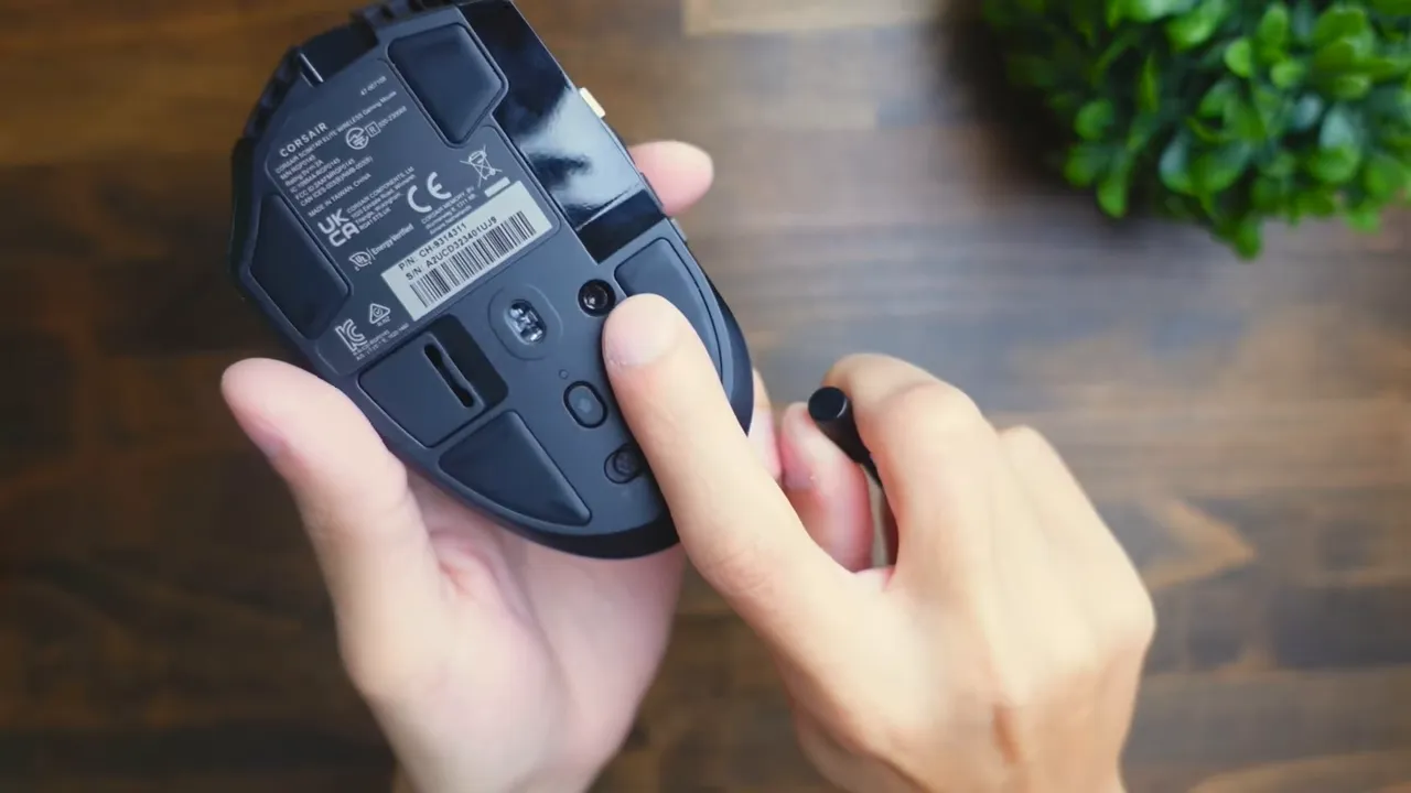Demonstration of adjusting the side buttons using the tool and sliding the module