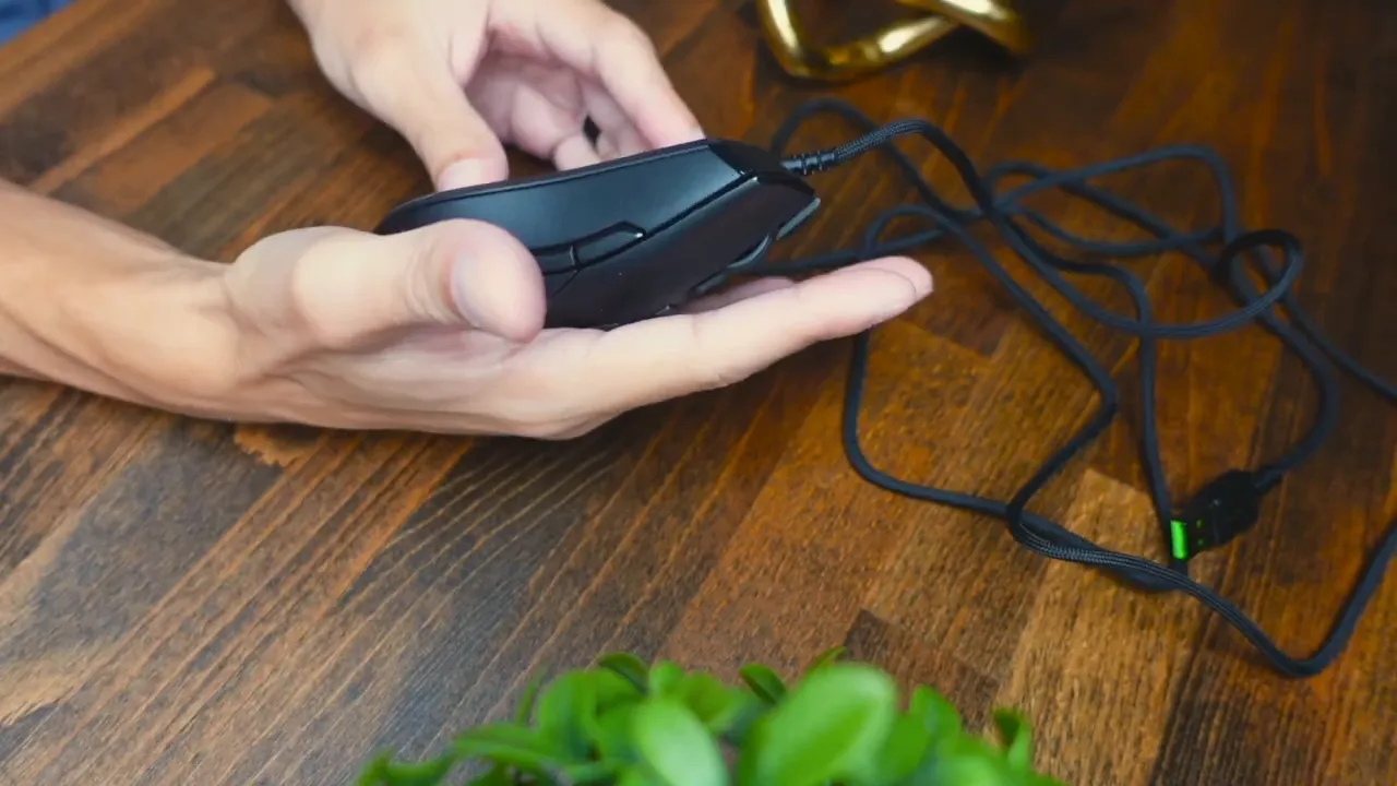 Side view showing small footprint and hand positioning