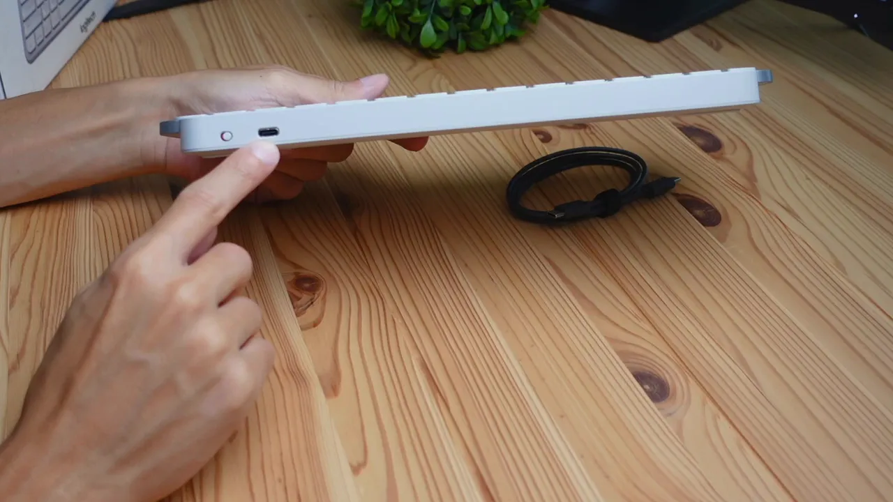 Side view showing on/off switch and USB-C charging port