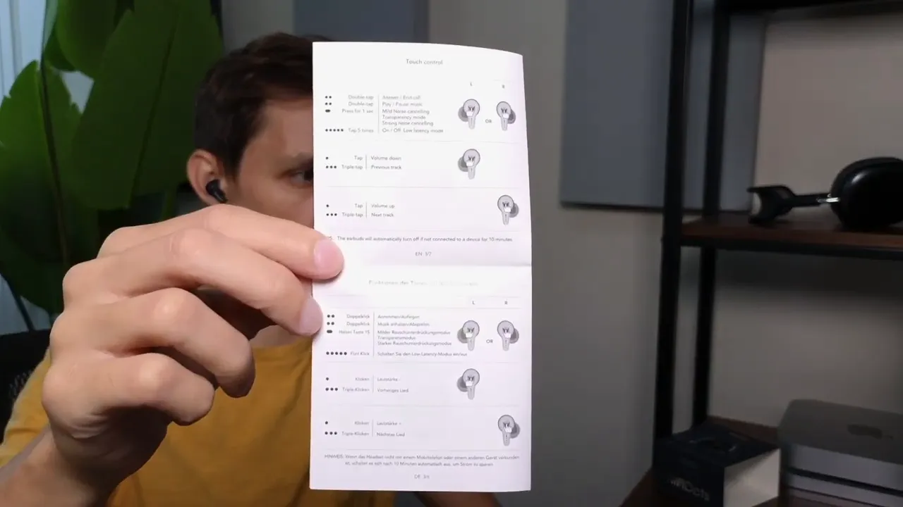 Close-up of a manual page titled 'Touch control' showing tap, double-tap and triple-tap icons with descriptions