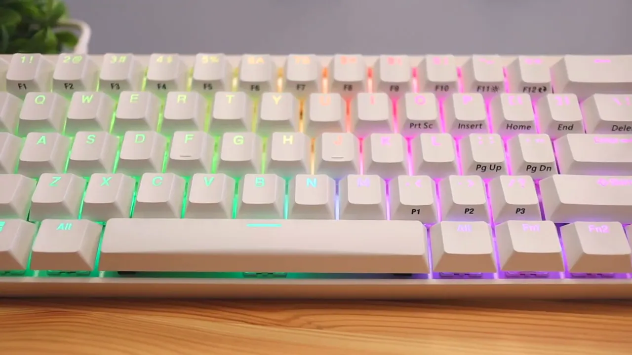 Top view of the white keyboard with multicolor RGB lighting across the keys