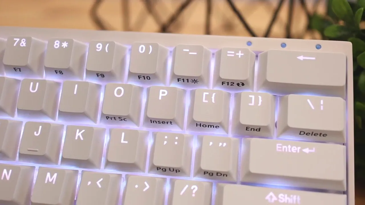 Top right section of the white keyboard showing legends for secondary functions