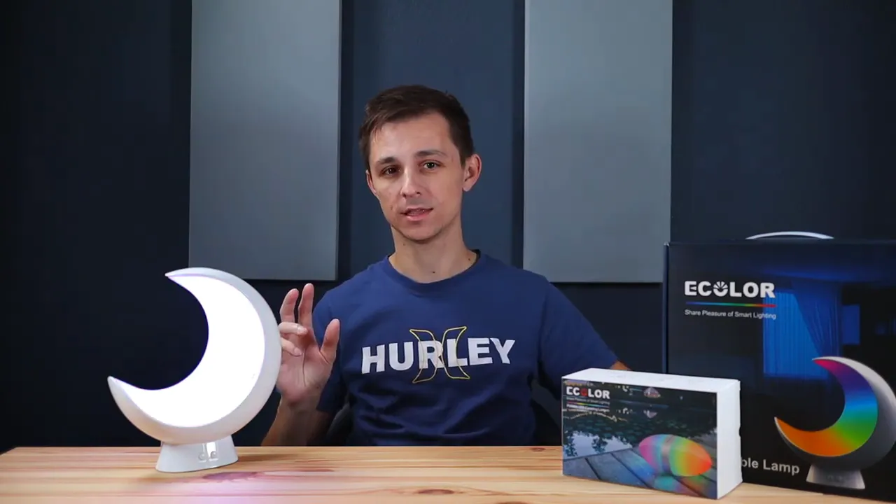 Ecolor Moon lamp on desk next to product box with visible front control buttons