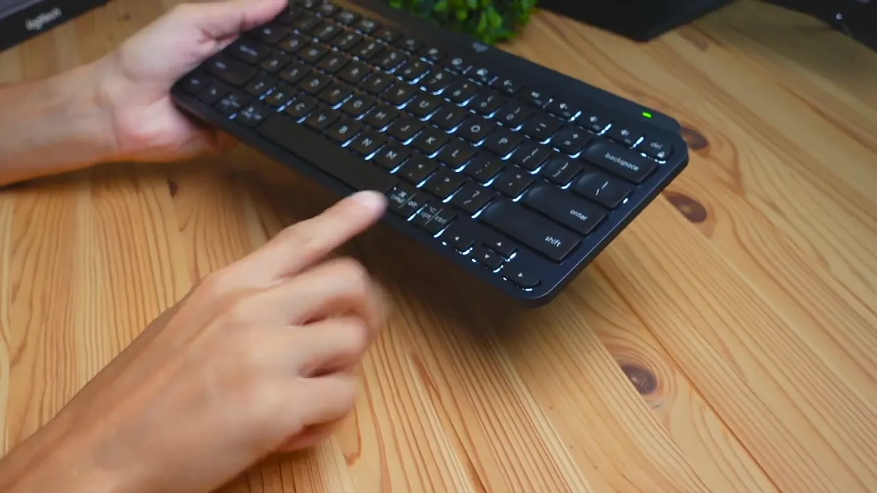 Keyboard lighting turned on showing subtle green glow