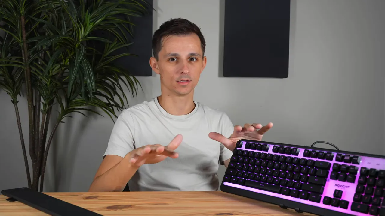 Hands hovering over Roccat Magma keyboard to demonstrate stability and minimal key wobble