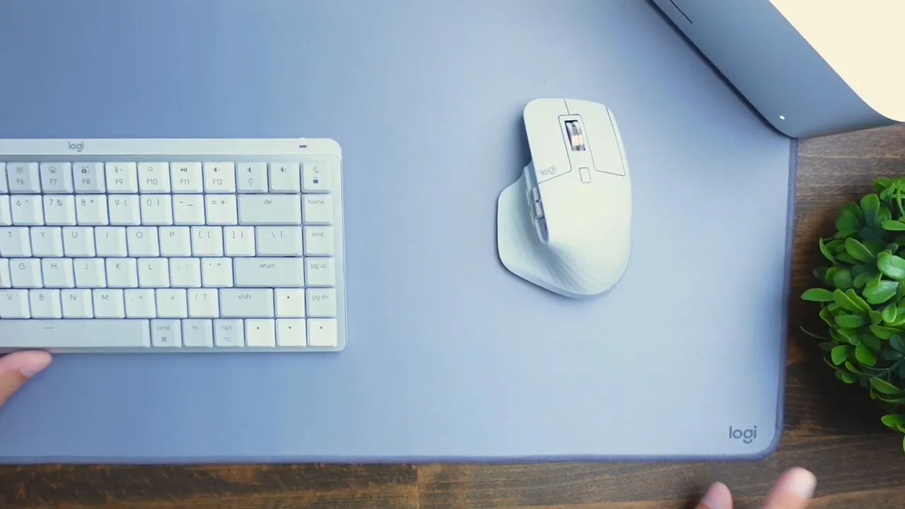 Logitech desk mat under keyboard and mouse