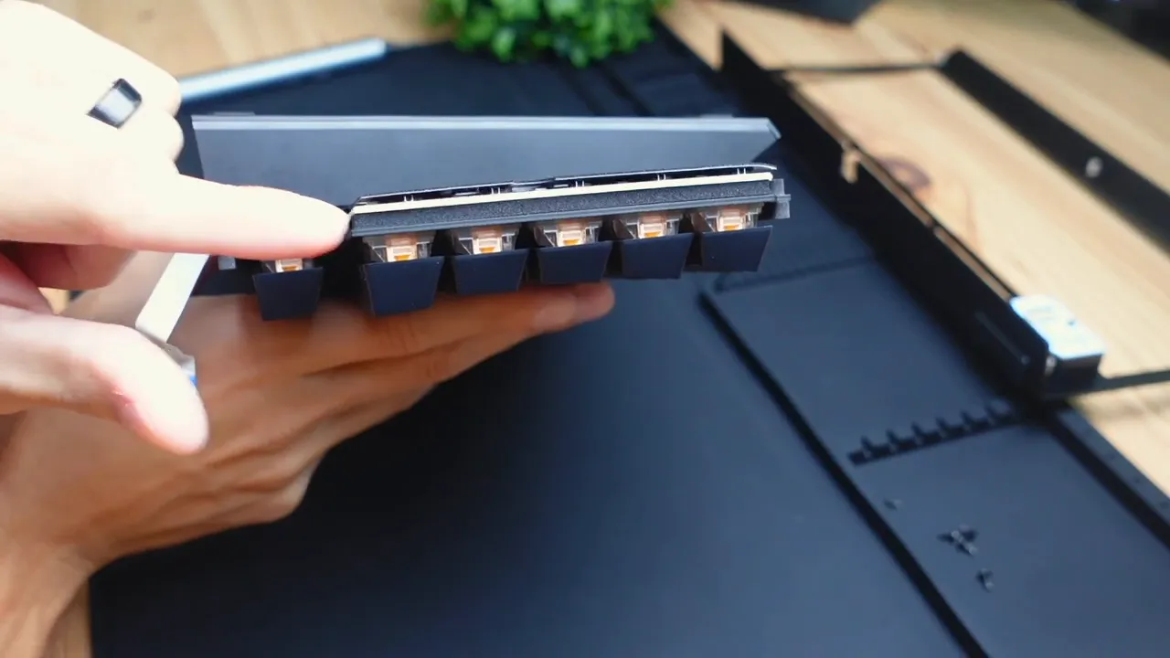 Side view showing foam lining around switches