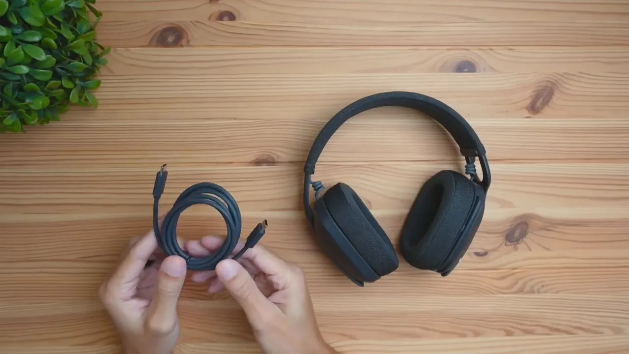 Zone Vibe 100 unboxed with USB-C cable and fabric drawstring bag