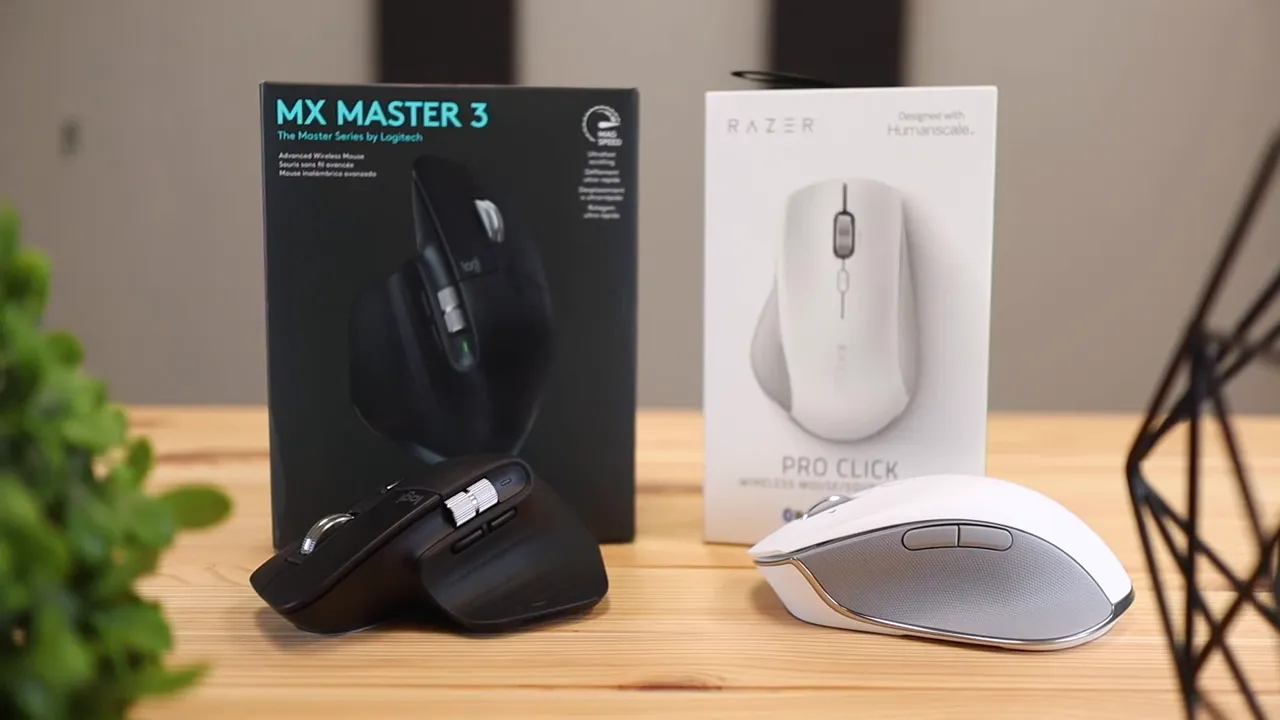 Logitech MX Master 3 box and mouse beside Razer Pro Click box and mouse