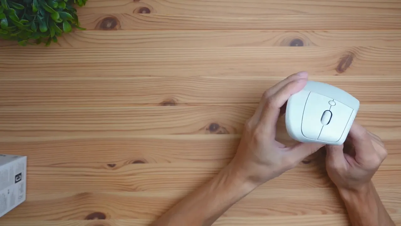 Pale gray Logitech Lift for Mac on a desk