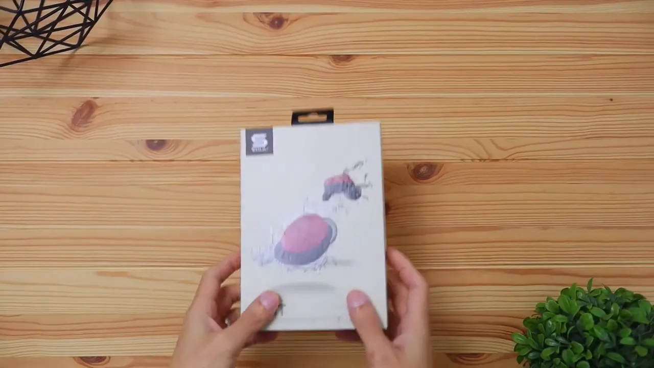 Soul S-FIT wireless earbuds retail packaging box shown on a wooden table