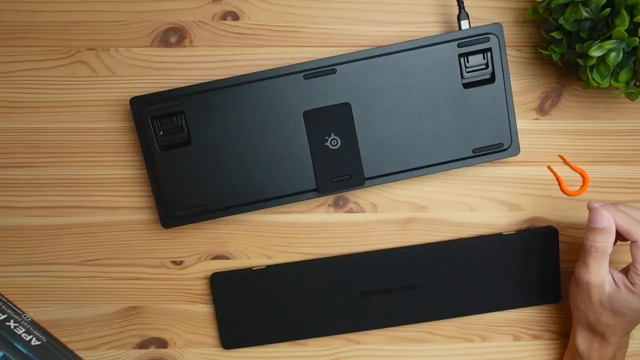 Keycap puller storage compartment underside view