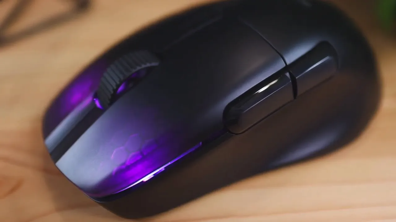 Top view close-up of Roccat Kone Pro Air with purple hexagon RGB lighting visible through translucent sections