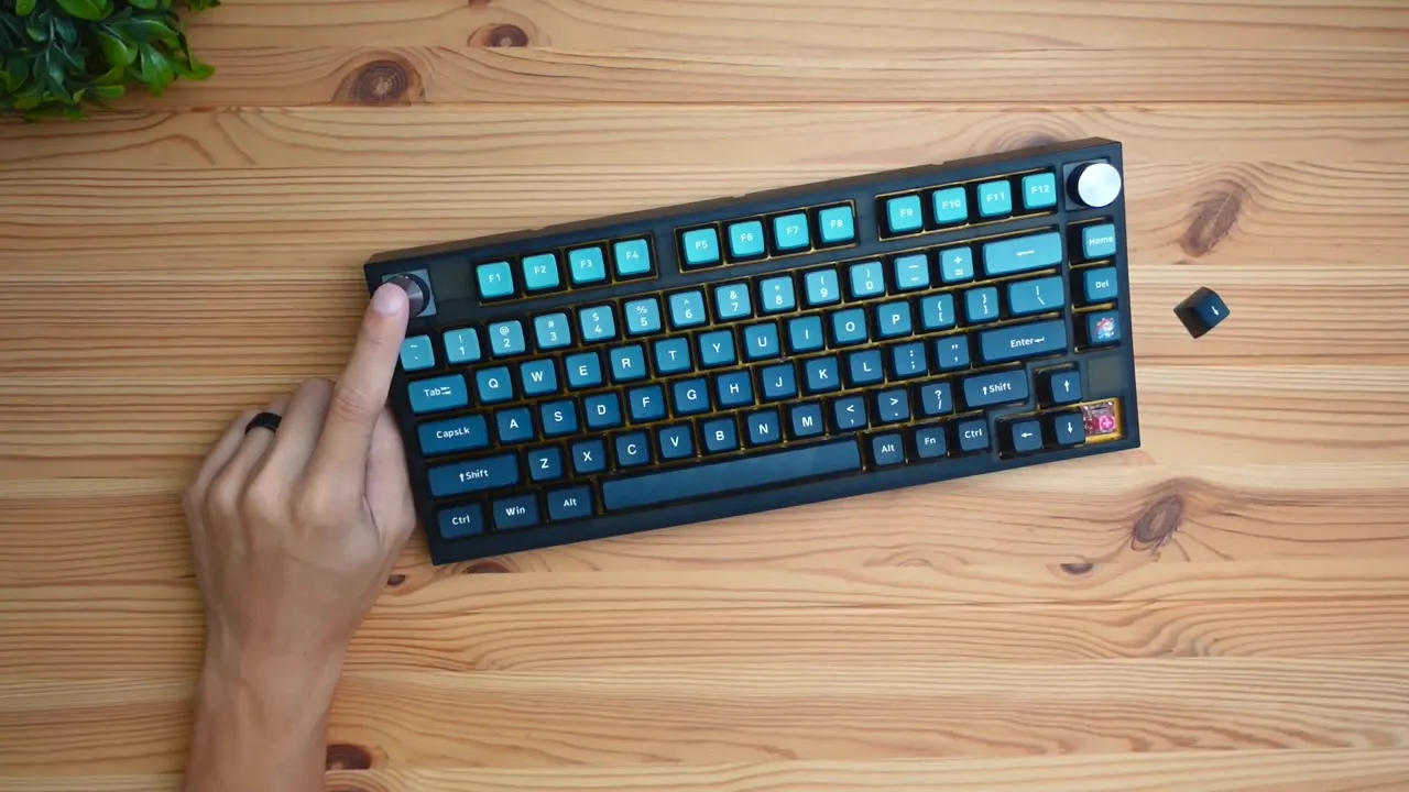 Top-down shot showcasing the GK75 layout and programmable knob