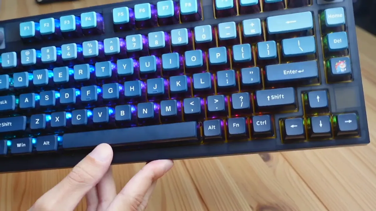 Side view of pudding-style keycaps showing transparent sides