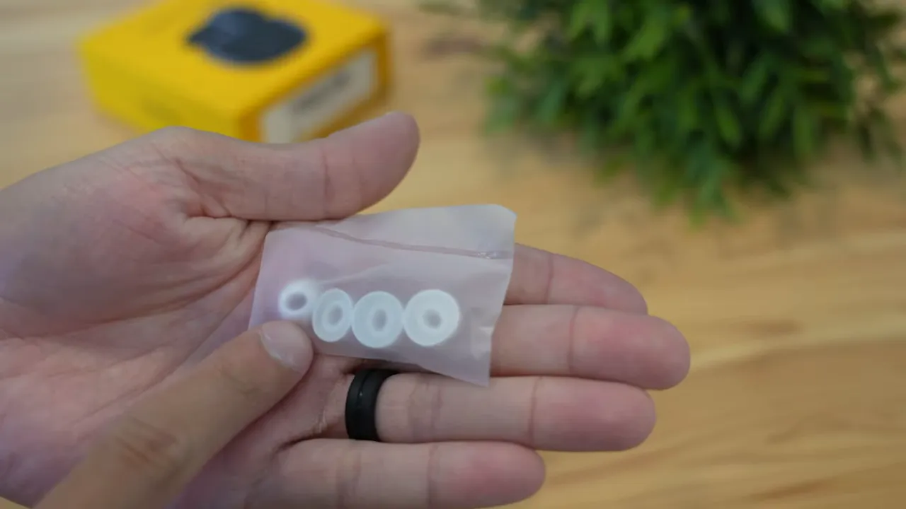 Realme Buds Air 2 silicone eartips (small, medium, large) on a palm