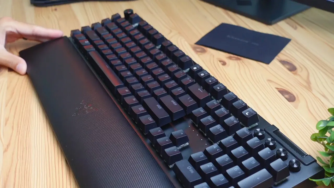 Keyboard propped up on highest legs for ergonomic tilt